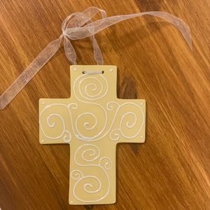 Yellow Cross with white decorative swirls